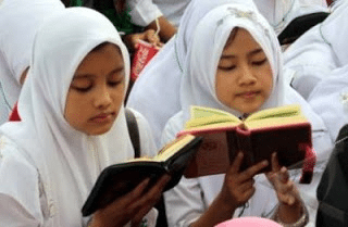 Girls Reading Quran.png