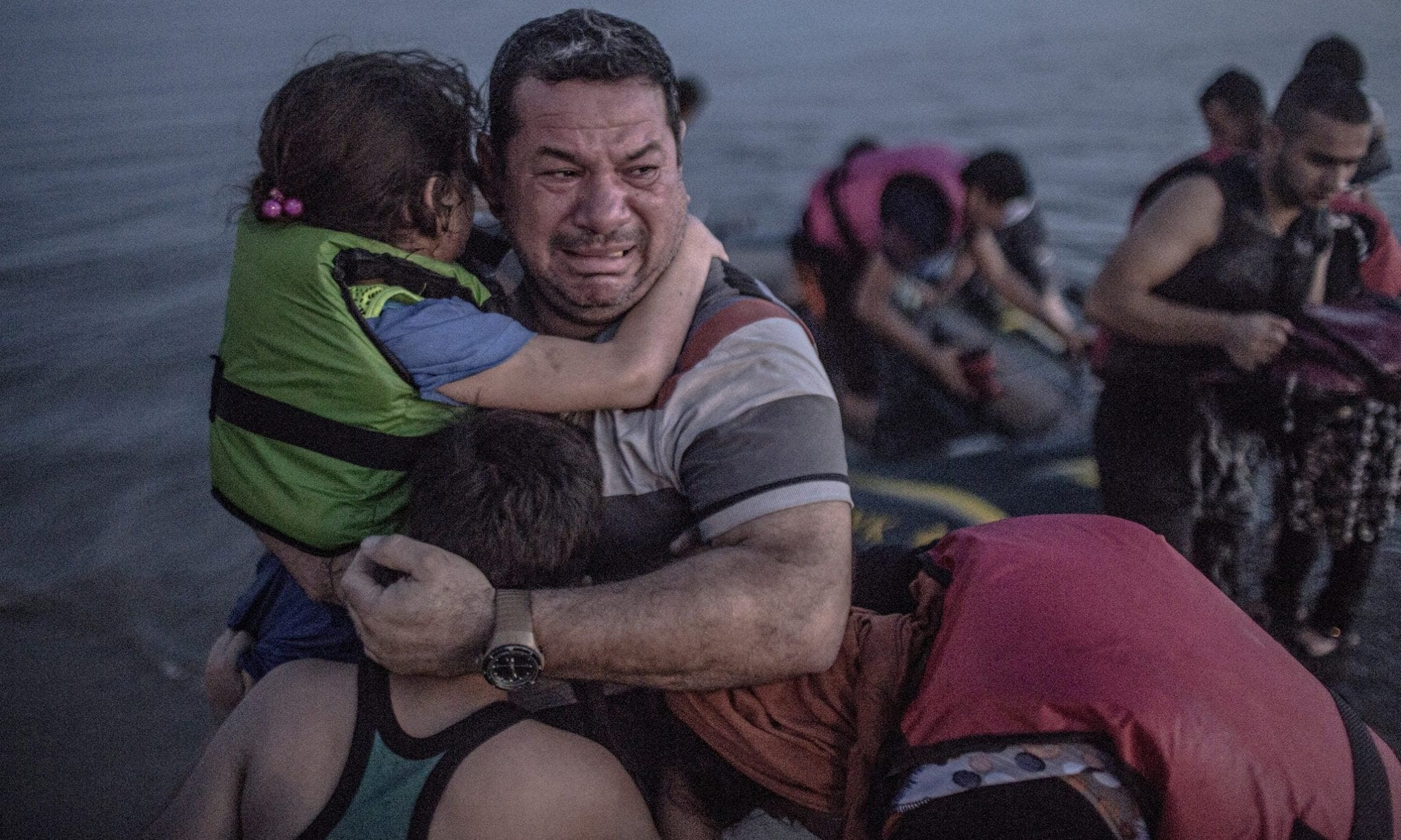 Laith Majid cries tears of joy and relief that he and his children have made it to Europe. Photograph: Daniet Etter/New York Times/Redux /eyevine