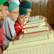 child reciting the holy quran