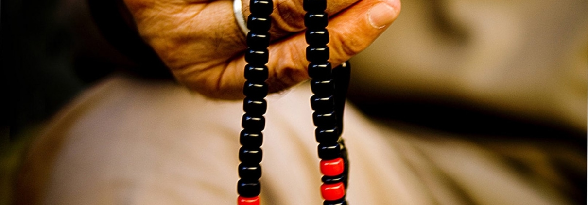 Premium Photo | The holy al quran with written arabic calligraphy rosary  beads or tasbih on white background