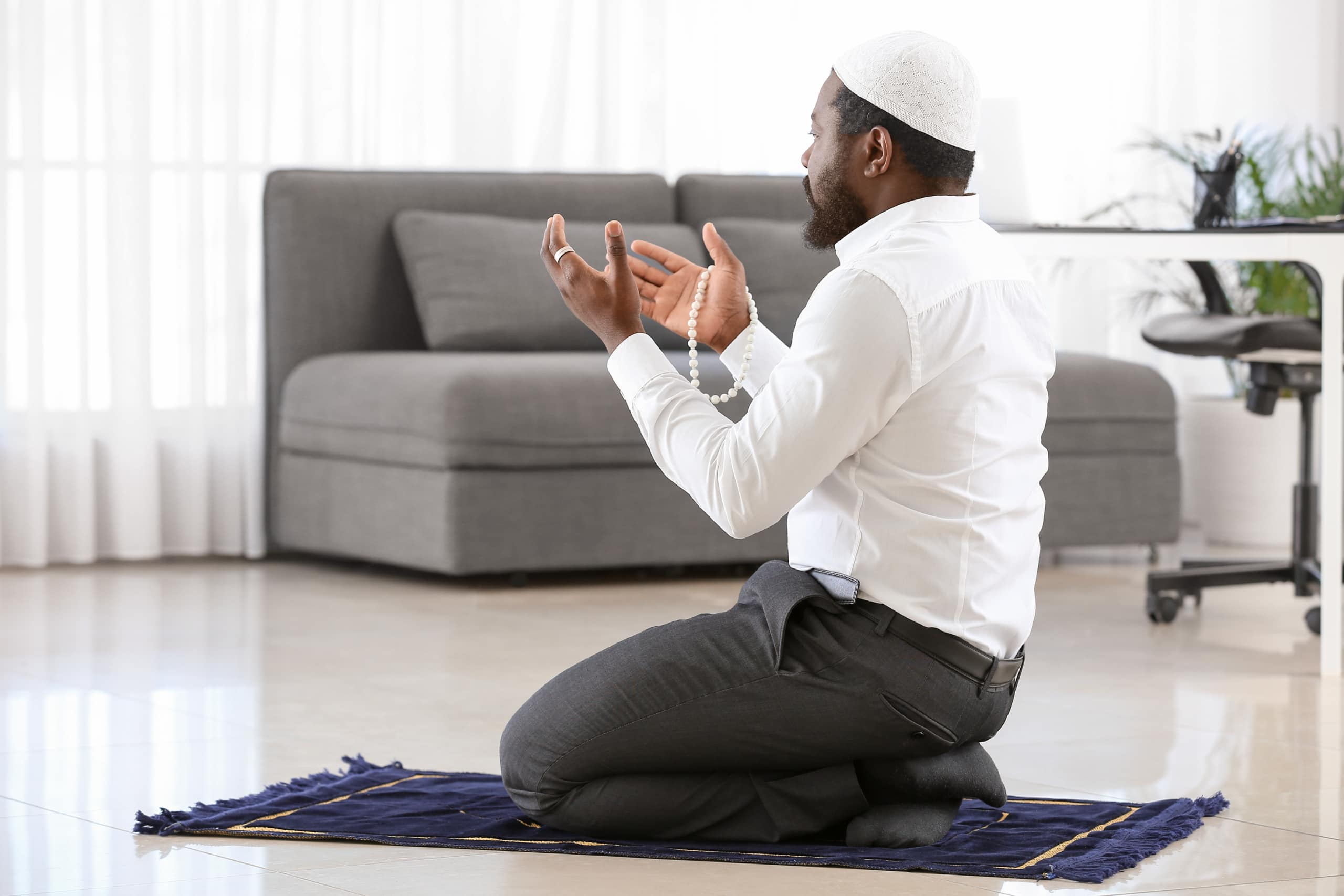 African-american,Muslim,Man,Praying,In,Office